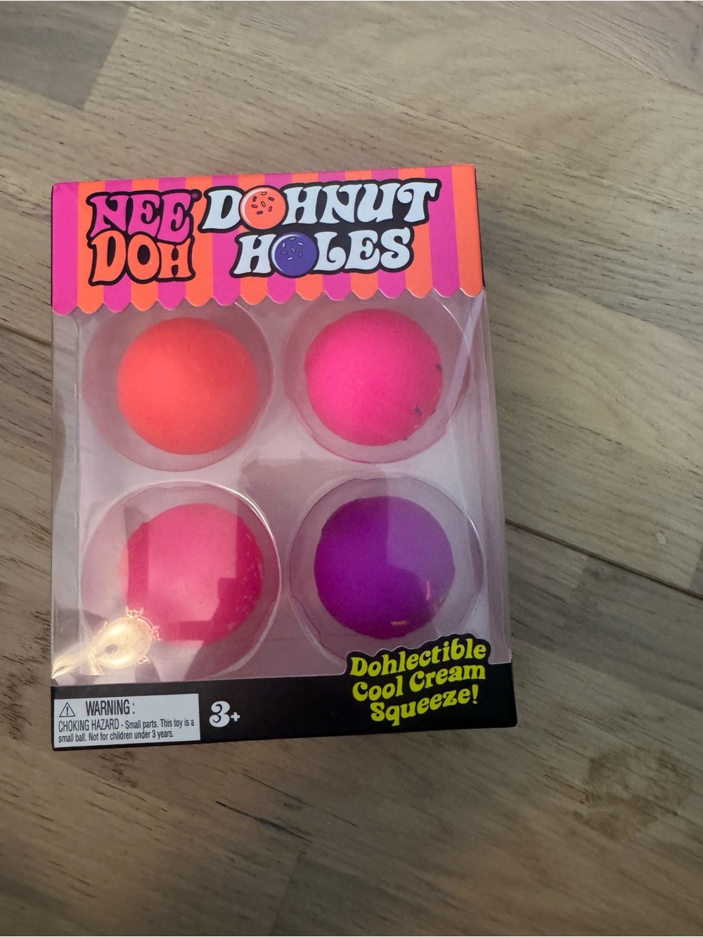 NeeDoh Donut Holes 4-Pack Stress Balls - Pink, Orange, Purple